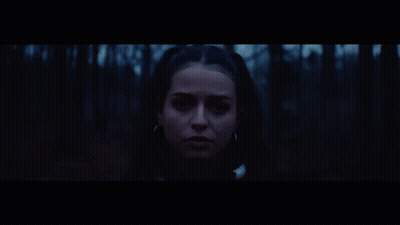 Woman Face With Red Lights GIF