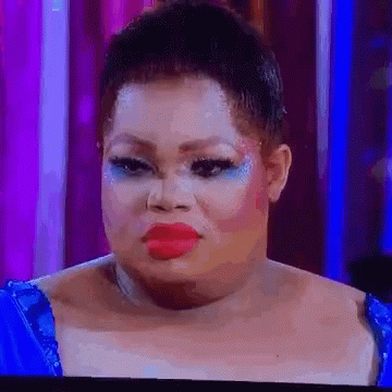 Woman Face With Red Lipstick And Blue Eyeshadow GIF