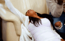 Woman Fall Out On Sofa GIF