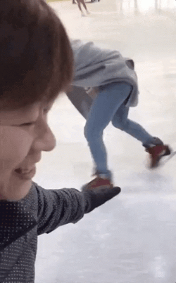 Woman Falling On Ice Skating  GIF