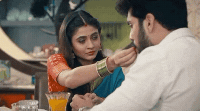 Woman Feeding Man GIF