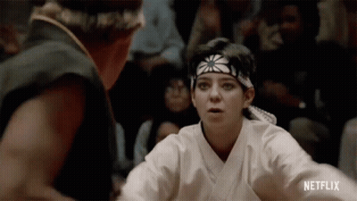 Woman Fighting Man In Karate Ring GIF