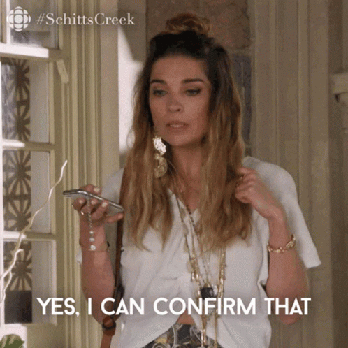 Woman From Schitt's Creek Holding Cell Phone Yes I Can Confirm That GIF