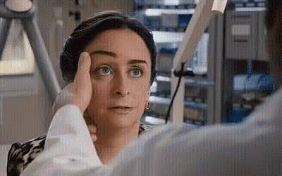 Woman Getting Eye Exam From Doctor GIF
