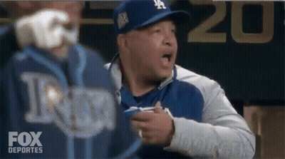 Woman Getting Haircut By Hairdresser In MLB Shirt GIF