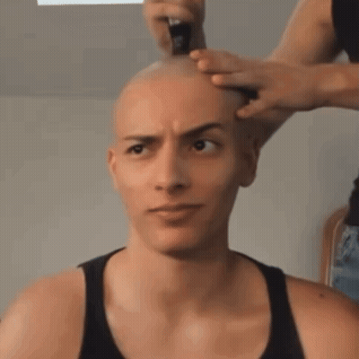 Woman Getting Head Shaved GIF
