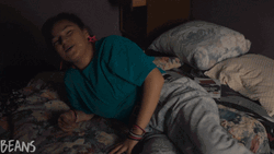 Woman Getting Into Bed You're So Funny Reaction GIF