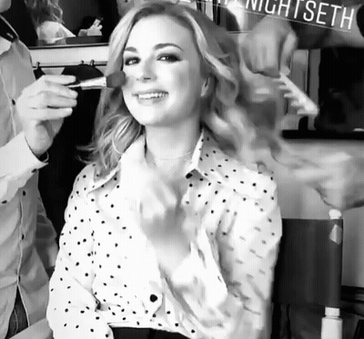 Woman Getting Makeup Done At Nightseth Sign GIF