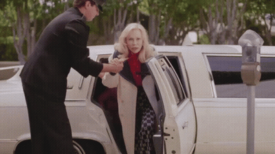 Woman Getting Out Of Limousine With Man Holding Her Hand GIF
