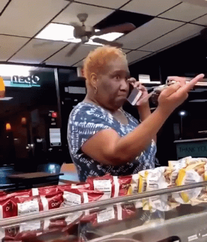 Woman Giving Middle Finger On Phone GIF