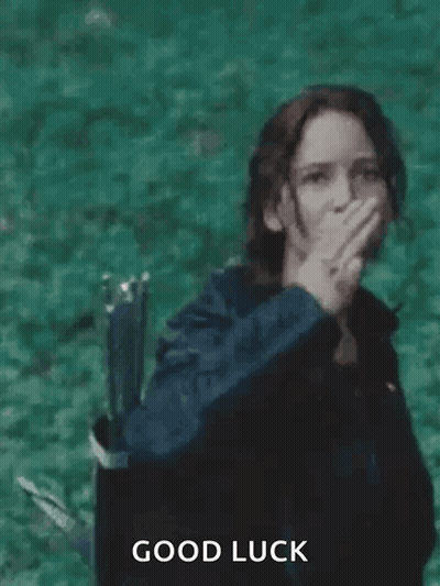 Woman Giving Peace Sign By Water GIF
