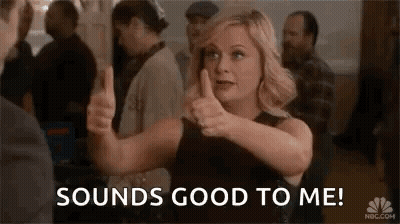 Woman Giving Thumbs Up In Front Of Crowd GIF