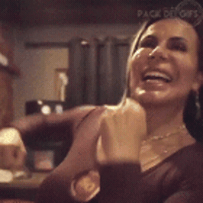 Woman Giving Thumbs Up In Mirror GIF