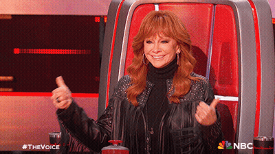 Woman Giving Thumbs Up In NBC Chair GIF