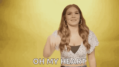 Woman Giving Thumbs Up Saying Oh My Heart GIF