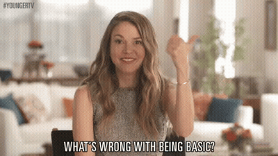 Woman Giving Thumbs Up Saying What's Wrong With Being Basic GIF