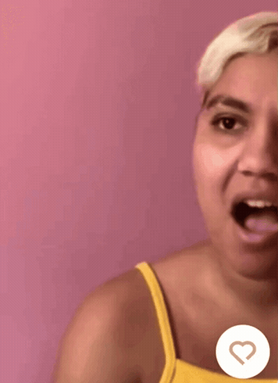 Woman Giving Thumbs Up With Heart Icon GIF