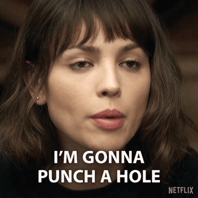 Woman Gonna Punch Hole In Netflix Ad GIF