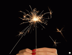 Woman Hand Holding Sparkles GIF