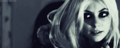 Woman Hand To Forehead In Black Tank Top GIF