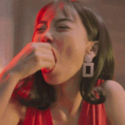 Woman Having Fun Chewing GIF