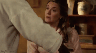 Woman Held By Man In Living Room GIF