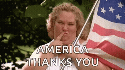 Woman Holding American Flag Saying America Thanks You GIF