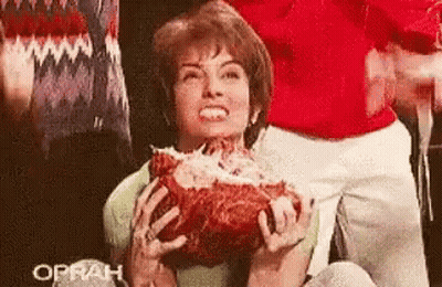 Woman Holding And Eating Large Meat GIF