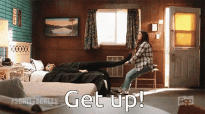 Woman Holding Another Woman's Leg Get Up