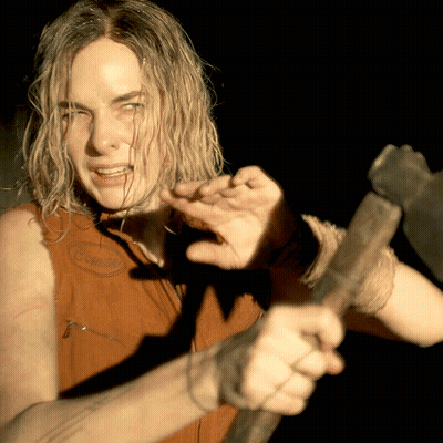 Woman Holding Axe In Columbia Tank Top GIF