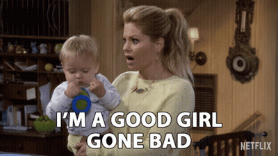 Woman Holding Baby Saying I'm A Good Girl Gone Bad GIF