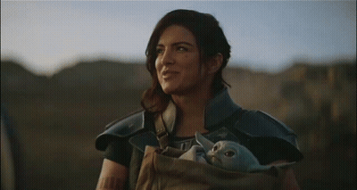 Woman Holding Baby Yoda GIF