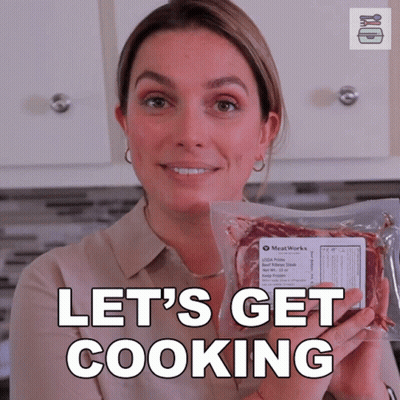 Woman Holding Bag Of Meat Saying Let's Get Cooking GIF
