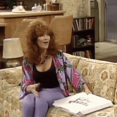 Woman Holding Bag Saying A GIF