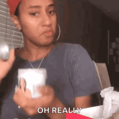 Woman Holding Ball Saying Oh Really GIF