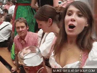 Woman Holding Beer While Man Looks On GIF