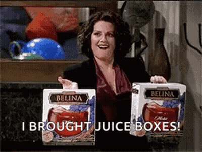 Woman Holding Belina Juice Boxes Says I Brought GIF