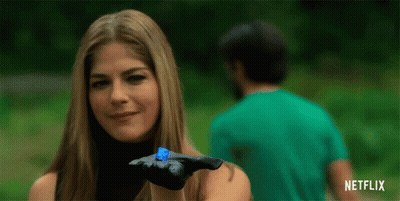 Woman Holding Blue Gummy Bear Netflix Logo GIF