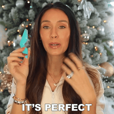 Woman Holding Blue Object Saying Perfect GIF