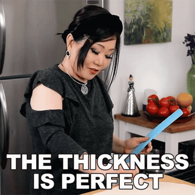 Woman Holding Blue Paper The Thickness Is Perfect GIF