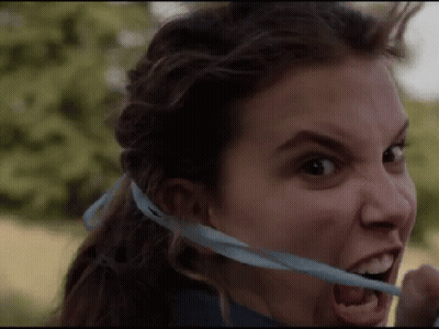Woman Holding Blue Ribbon In Mouth GIF