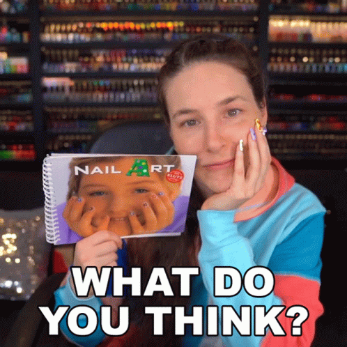 Woman Holding Book That Says Nail Art GIF