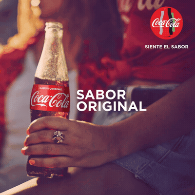 Woman Holding Bottle Of Coca-Cola GIF