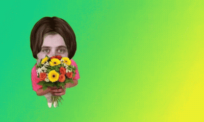 Woman Holding Bouquet Of Flowers GIF