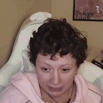 Woman Holding Bow And Arrow Next To Shirtless Man GIF