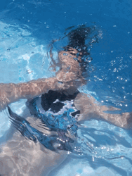 Woman Holding Breath Under The Pool GIF