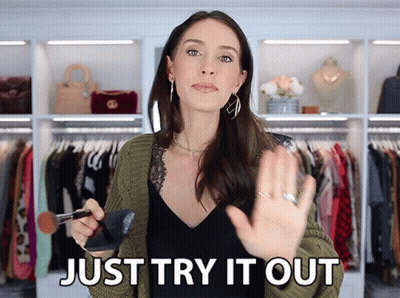 Woman Holding Brush Says Try It Out GIF
