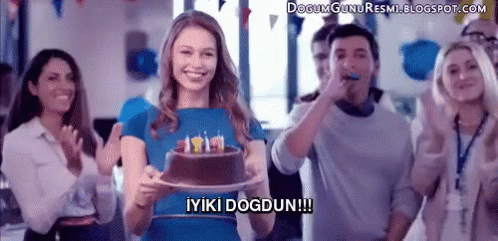 Woman Holding Cake With Candles GIF
