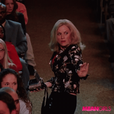 Woman Holding Camera In Front Of Crowd Meangirls GIF