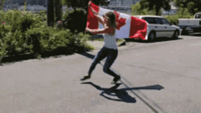 Woman Holding Canadian Flag GIF